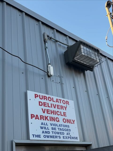Commercial exterior work from a bucket lift